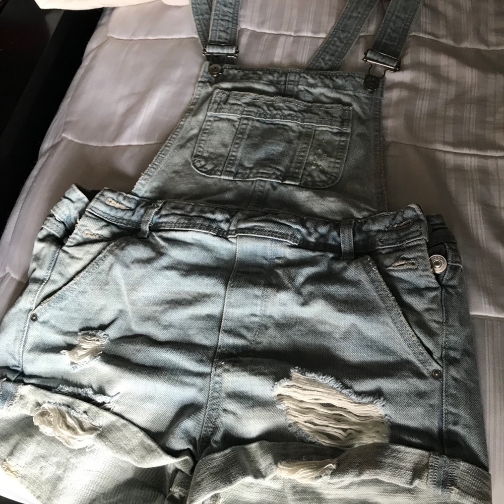 Destroyed jean overalls